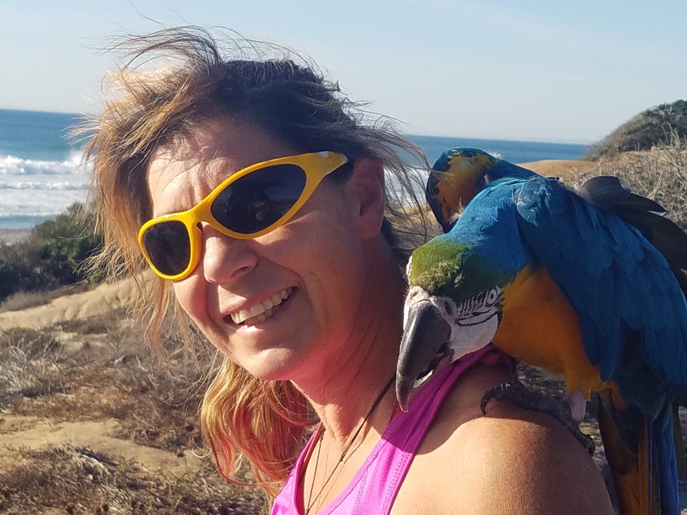 Juliette with a blue-and-gold macaw