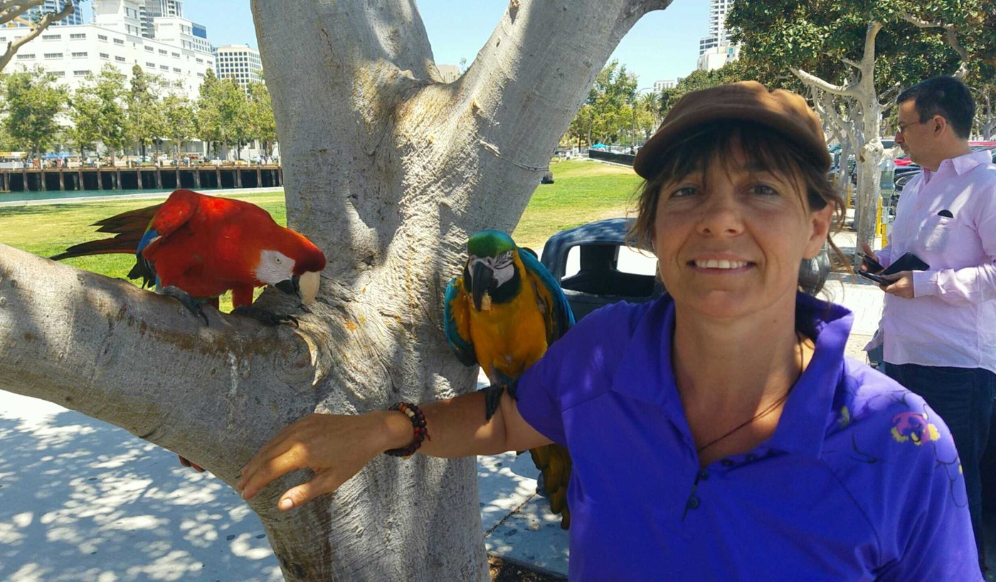 Juliette with two macaws